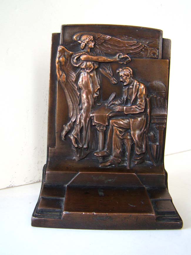 A rare but single bookend depicting Abraham Lincoln "The Emancipator" made by the Pompeian Bronze Company circa 1925